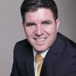 headshot of greg
